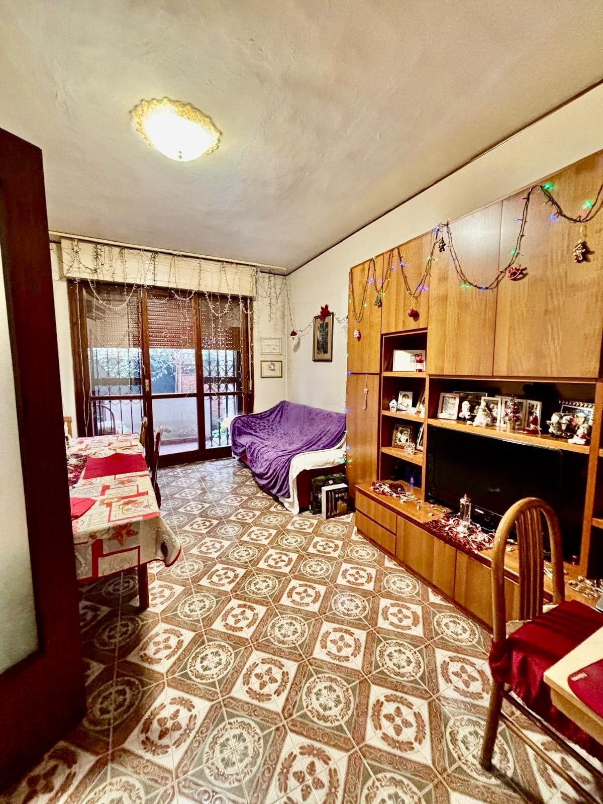 APPARTAMENTO CON GIARDINO E POSTO AUTO