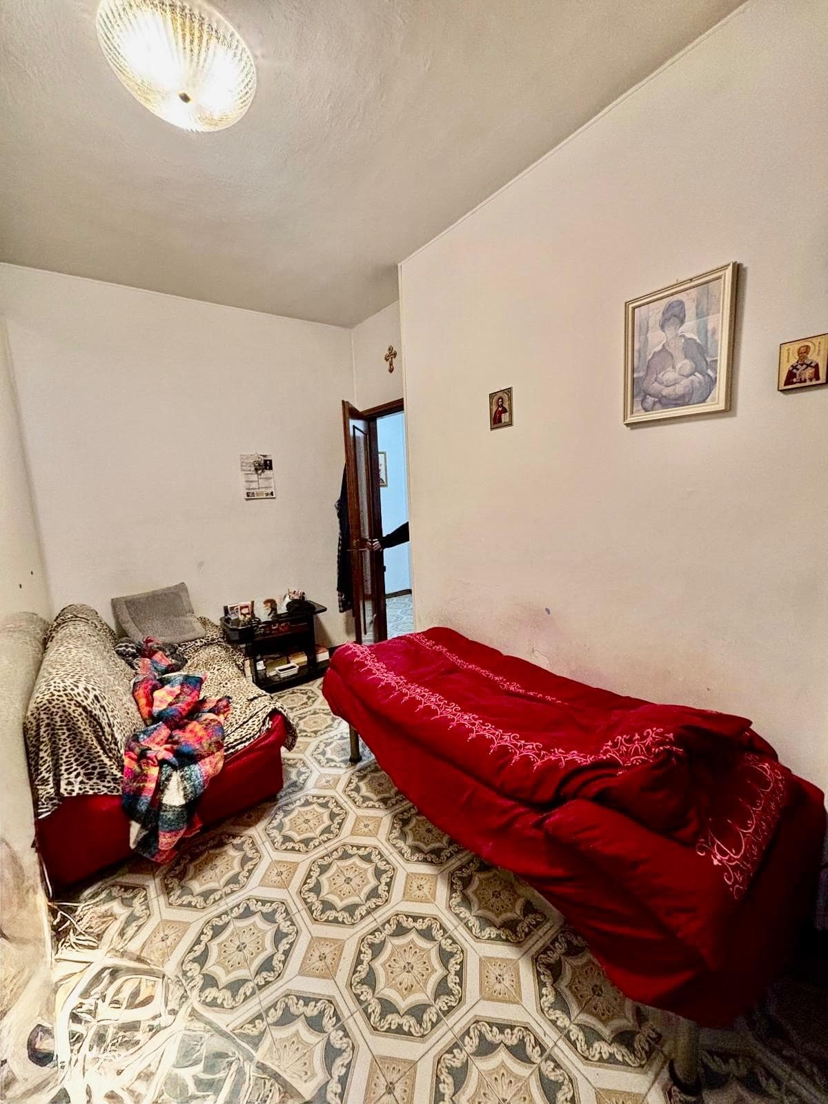 APPARTAMENTO CON GIARDINO E POSTO AUTO